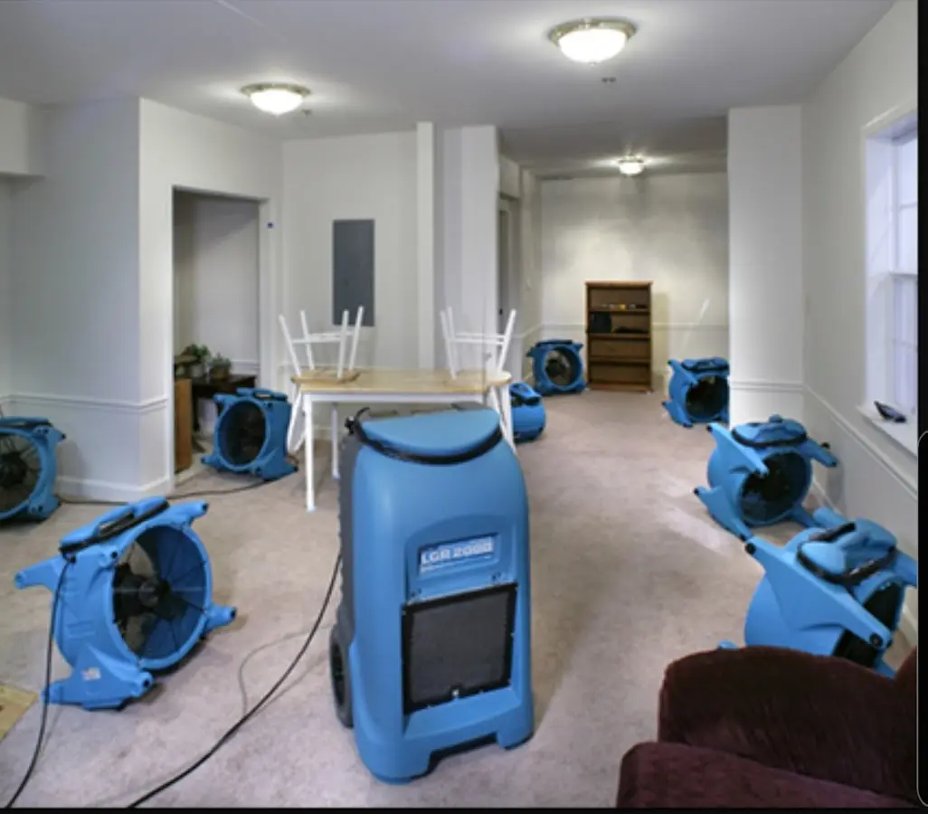 Air movers and dehumidifier setup for Water Damage Restoration in Mills River